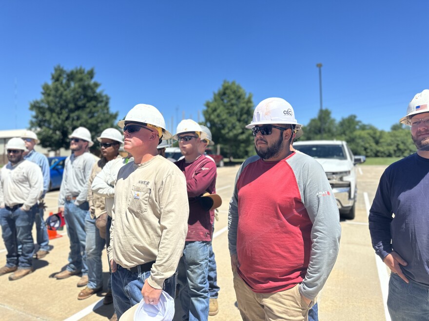 Apprentice and journeyman linemen watch a demonstration about the deadly effects of powerlines during Essential Skills Training at OAEC headquarters in Oklahoma City on May 20, 2025. Journeymen are certified after four years of apprenticeship.