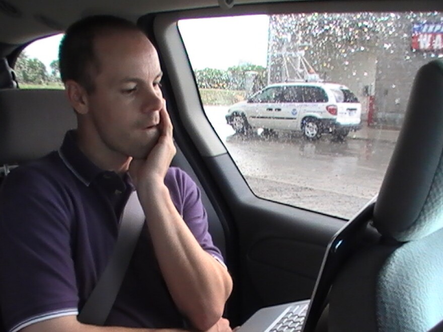 Paul Markowski, pondering the radar, on the road with VORTEX2 in 2009.