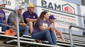 Lynsey Edge, a Columbia County resident, sits in the stands before a Columbia High School football game in Lake City, Fla. Friday, Sept. 17, 2021. Edge, whose son is a wide receiver for the team, said that it was scary for her to think about what could have happened at games before the county implemented new safety measures at all sporting events. (Julia Cooper/WUFT News)