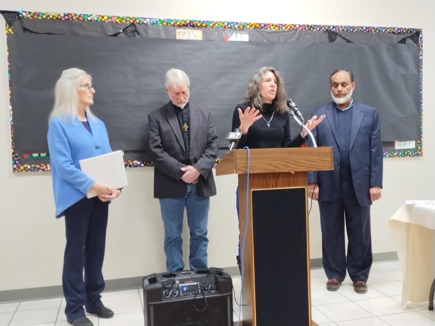 Rabbi Michal Woll of Congregation Shir Hadash in Milwaukee responds to a question at Thursday's news event.