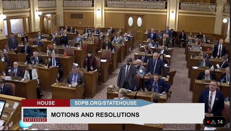 Some House members stand in support of a "smokeout" of a recently killed bill that would have cut sales tax on groceries in South Dakota. The effort failed to receive the 1/3 support needed to revive the bill.