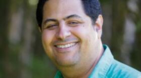 a portrait of a man outside