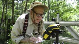 Bob Vollmer, seen in a 2016 photograph provided by the Indiana Department of Natural Resources, shows the now-102-year-old at work. The state's oldest employee plans to retire next month, after nearly six decades on the job. CREDIT: John Maxwell/Indiana Department of Natural Resources via AP