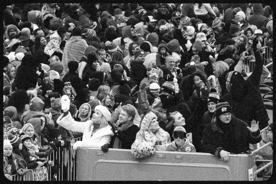  Kansas City Chiefs owner and CEO Clark Hunt, center, and coach Andy Reid, bottom right, on a bus in the Super Bowl victory parade on Feb. 15, 2023.
