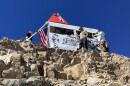 Hikers stand next to the hut at the top of Mount Timpanogos on Sept. 20, 2026.