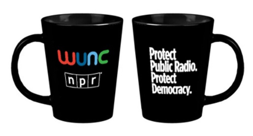 A black mug with the WUNC and NPR logos on one side and "Protect Public Radio. Protect Democracy." in white text on the other.