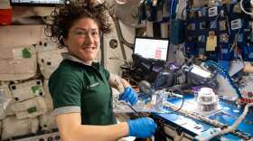 NASA's Christina Koch works on a science experiment installed on the International Space Station. Photo: NASA