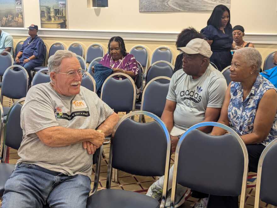 Members of the audience talk through the ways hearing others' stories can lead people to reconsider their experiences.