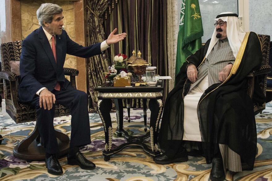 Secretary of State John Kerry meets Saudi Arabia's King Abdullah at his desert encampment in Rawdat al-Khuraim on Jan. 5, 2014. The king died on Friday at age 90.