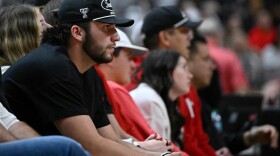  Brendan Sorsby watches the second half of an NCAA college basketball game 
