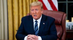 US President Donald Trump addresses the nation from the Oval Office about the widening Coronavirus crisis in Washington, DC.  