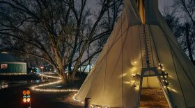 Yurts and tipis at the Outer Range campus were illuminated on December 9, 2021