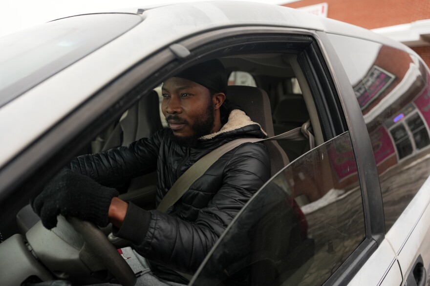 Roudechel Charpentier, a Haitian migrant who lives and works legally in the U.S. under Temporary Protected Status, gets ready to drive to a college class,Tuesday, Feb. 3, 2026, in Springfield, Ohio. 