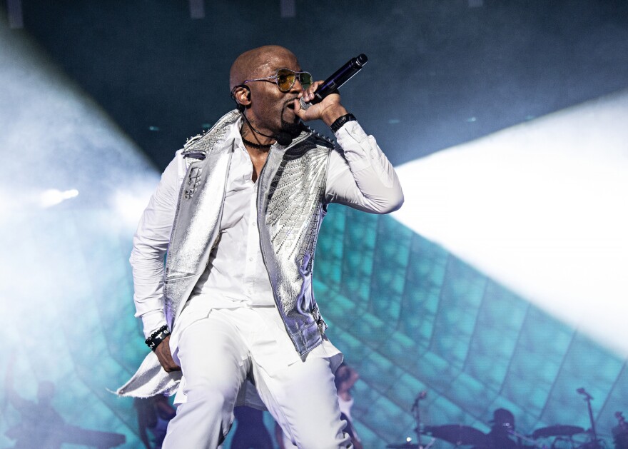 FILE - In this July 8, 2018 file photo, Teddy Riley performs at the 2018 Essence Festival in New Orleans. Riley, the singer and producer behind hits for Michael Jackson, says now that he’s days away from his big show at the Apollo Theater, a return to his hometown in Harlem after more than 20 years, he’s struck with emotion. Riley, who spearheaded the New Jack Swing era in music in the '80s and '90s, will headline two shows Sunday at the Apollo along with R&B maven Keith Sweat. (Photo by Amy Harris/Invision/AP)