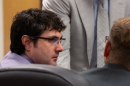 Samson Garner listens as his lawyers talk.
