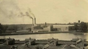 An archival black and white photo of the White Oak Mill in Greensboro.