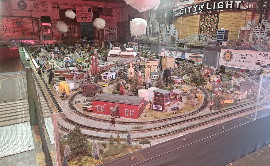 Cambridge City Manager Glenn Steckman leads a visit to the old City Hall building on Gay Street, where the Rescue Fire Company's Train Garden rests idle after its winter holiday run.