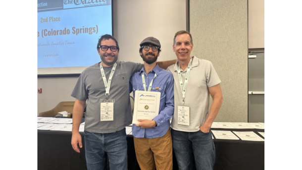 Sopris Sun editor Raleigh Burleigh, center, receives Colorado Press Association awards in 2025