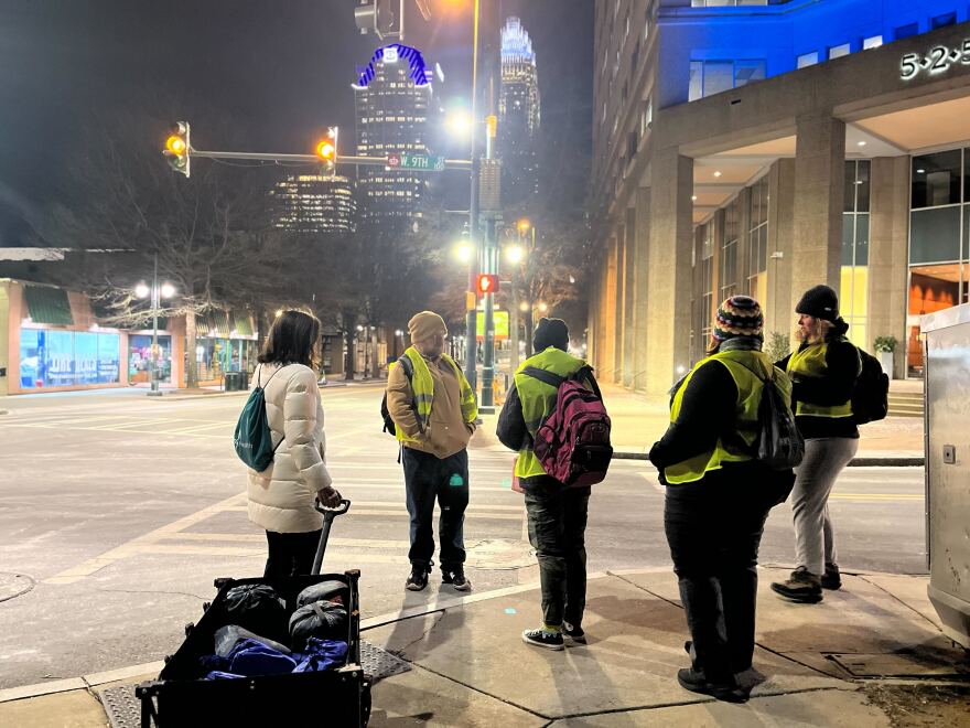 A group of surveyors in uptown Charlotte at 4 a.m. on Jan. 23.