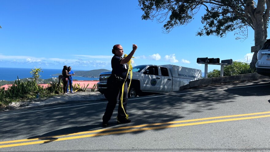 The Virgin Islands Medical Examiner leaves the scene of the crime Tuesday morning with the body of Jamil Hakem Salem, 70, who was stabbed to death at a residence in Lower Lerkenlund.