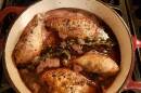 Coq au vin simmering. Ryan Merkley, CC BY 2.0 <https://creativecommons.org/licenses/by/2.0>, via Wikimedia Commons