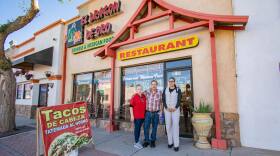 Jazmin Zamudio, economic development director for Somerton, with the owners of El Dragon De Oro restaurant, which has served Chinese and Mexican food on Main Street since 1993.