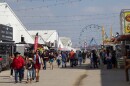 San Antonio Stock Show & Rodeo visitors walk around the livestock and cattle barns.