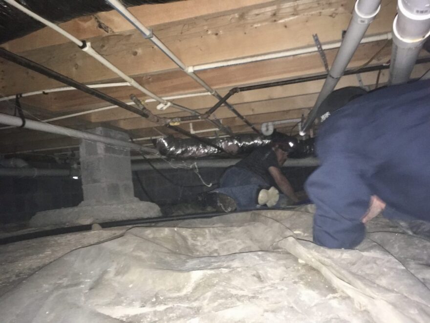 Energy auditors assess a Letcher County, Ky., home.