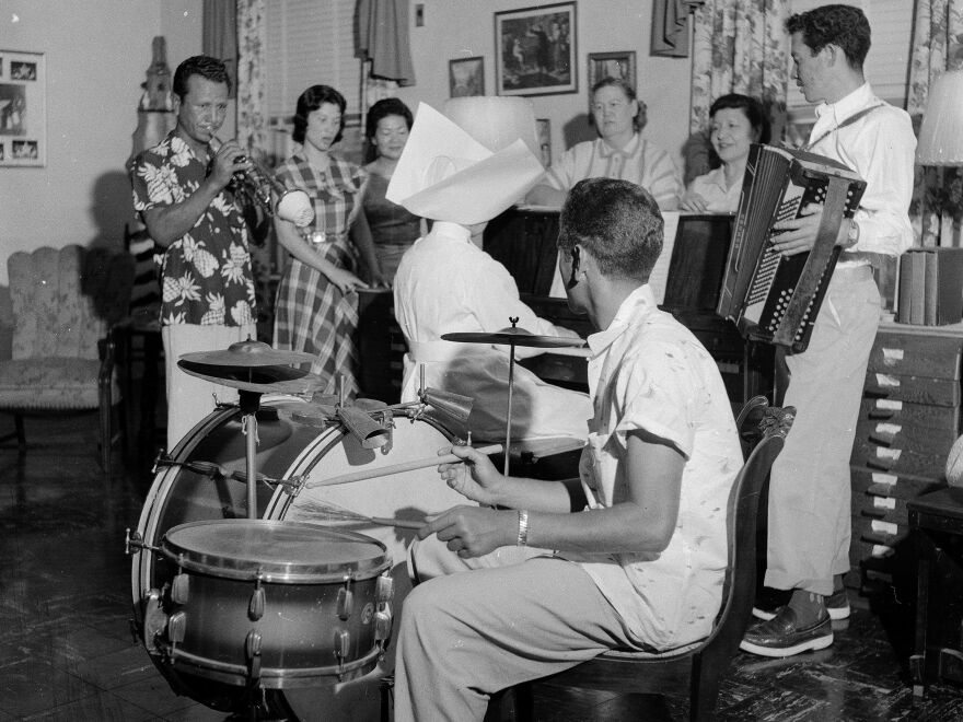 Patients at the Carville, La. hospital enjoying a musical evening around 1955.