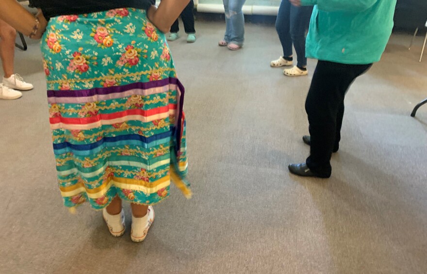 Native American students dance at a summer camp in Chicago.