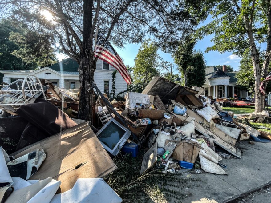 Damaged items on Maple Street in Waverly, Tenn., on Aug. 24, 2021, after a catastrophic flood.