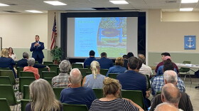 Jeff Szabo, CEO of the Suffolk County Water Authority, speaks to an audience of 50 community members and elected officials at the Southold Town Recreation Center on August 20.