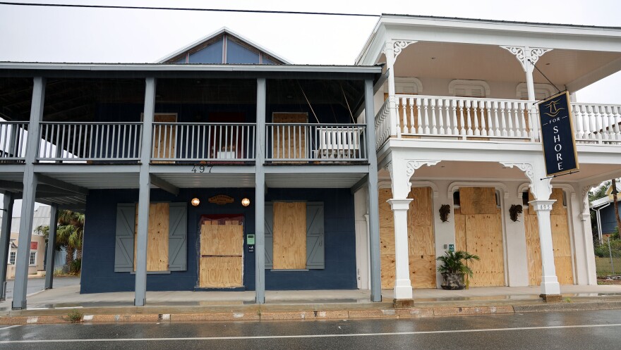 Store windows are boarded in Cedar Key in preparation for Hurricane Helene which is expected to make landfall as a Category 3 hurricane Thursday evening. (Azhalia Pottinger/WUFT News)