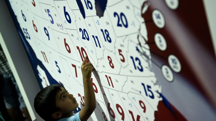 A boy examines CSPAN's 2012 presidential race electoral map at the American Presidential Experience exhibit last month in Charlotte, N.C.