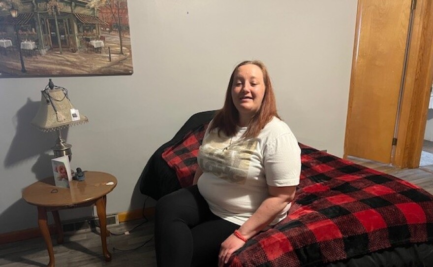 A client in one of the recovery house bedrooms