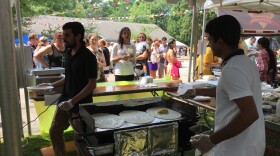 Crowds lined up at St. Gregorios in Macedonia for south Indian dishes such as dosa -- being prepared on the grille -- which is a crepe-like shell filled with potatoes.