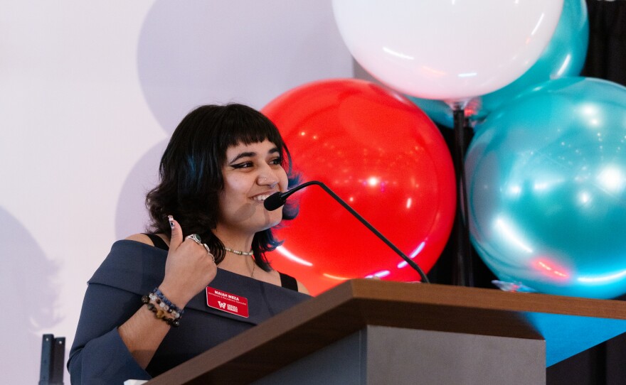 AWC Admissions and Recruitment Specialist Maiah Meza addressed the crowd grinning.