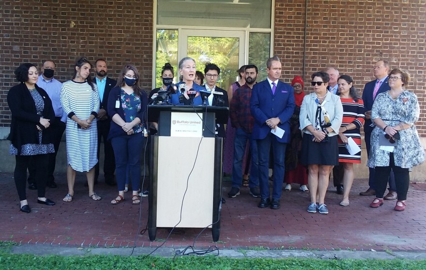 Eva Hassett, executive director of the International Institute of Buffalo, speaks during the launch of Buffalo United for Afghan Evacuees. The Institute is one of the several members of the WNY Refugee and Asylee Consortium, which is leading the campaign to acquire resources to help incoming Afghan evacuees settle in the Buffalo area.