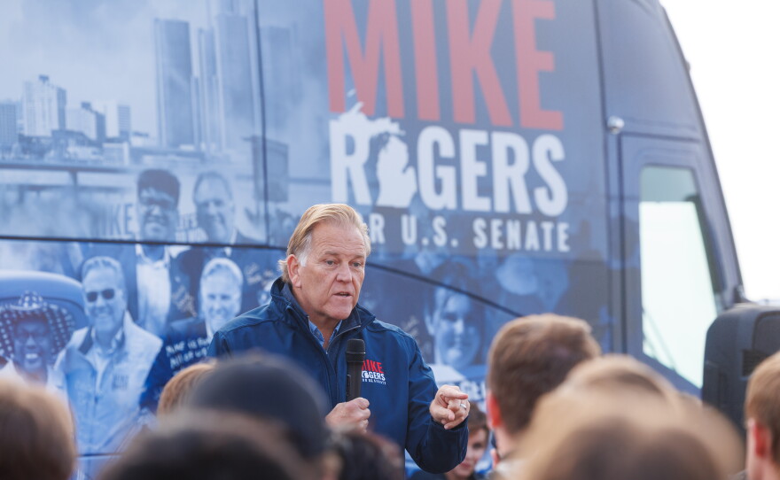 Republican U.S. Senate nominee Mike Rogers speaks in Lansing Township, Mich., on Oct. 24, 2026, during a stop on his "We Have a State to Save" bus tour.
