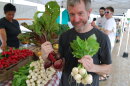 Mike Odette, chef and co-owner of Sycamore Restaurant, finds beets and turnips that will make tasty refrigerator pickles at the Columbia, Mo., farmers market.