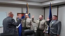 From left to right, park Rangers O’Mealy, Williams, and Agin are sworn in by Jeff Rasmussen, Director of the Division of Utah State Parks.