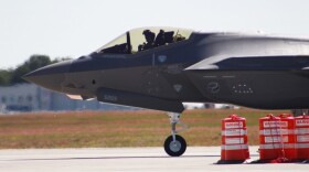 An F-35 jet sits on a runway. 
