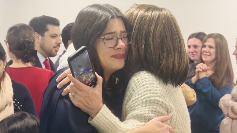 Gabrielle Bell embraces a loved one after learning she was matched with her first choice at LECOM and RRH's Match Day.