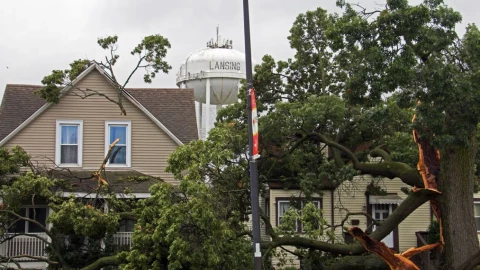 Storm damage can be seen throughout Lansing, Illinois, on Aug. 14, 2026.