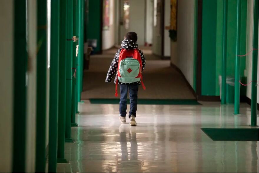  A student walks down the hallway at Cactus Elementary School in Cactus in 2020. 