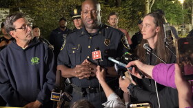 Seattle Police Assistant Chief Tyrone Davis speaks at a press conference with Gov. Bob Ferguson, left, and Seattle Mayor Katie Wilson, right, following a shooting at Seattle Center Sunday, July 26, 2026.