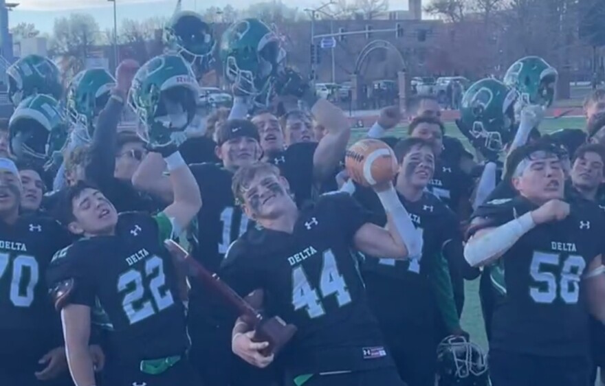 Senior Running Back Talan Hulet and the Delta Panthers celebrate winning the 2A State Football Championship in Grand Junction.