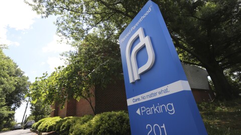 This May 15, 2019, file photo shows a sign in front of the Planned Parenthood offices in Richmond, Va.