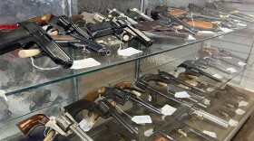Different caliber guns on display when clients walk in to New American Arms. Photo By Sam Britt/CNS.