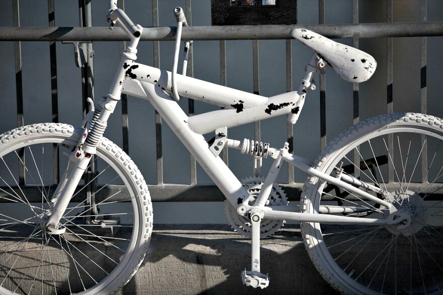 A bike painted white in memory of a cyclist